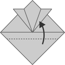 イラスト：下の三角形の上の1枚を点線で前に折る。